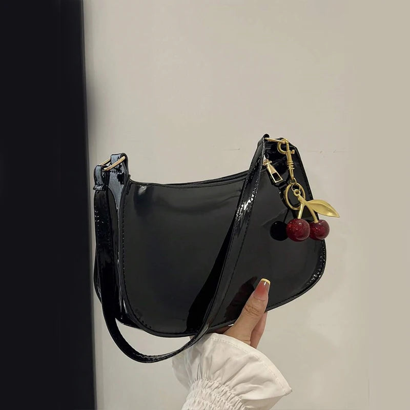 Synthetic leather women's handbag from Corporación Turística, stylish white shoulder bag with elegant design.