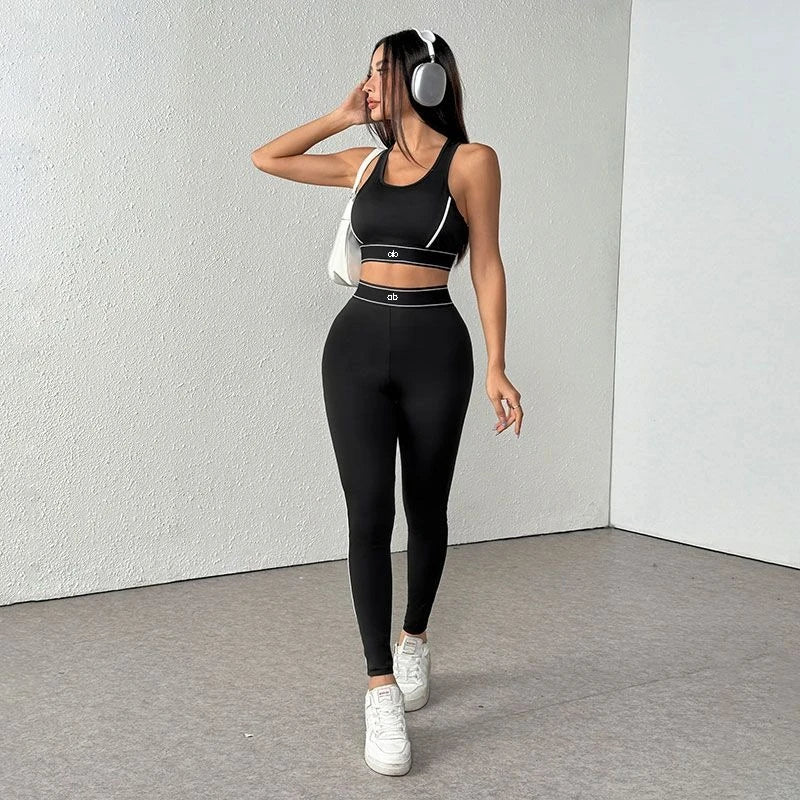 White women's 2-piece yoga set by Corporación Turística featuring European style, comfortable athletic wear for active lifestyles.