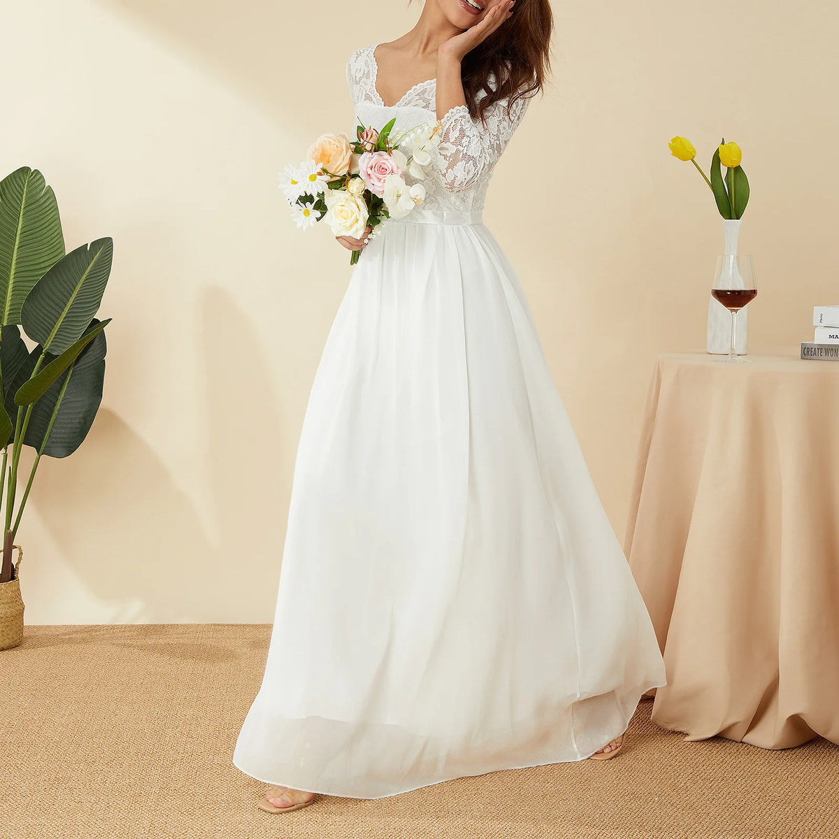 Elegant white long gown by Corporación Turística featuring lace and chiffon fabric, perfect for formal occasions.