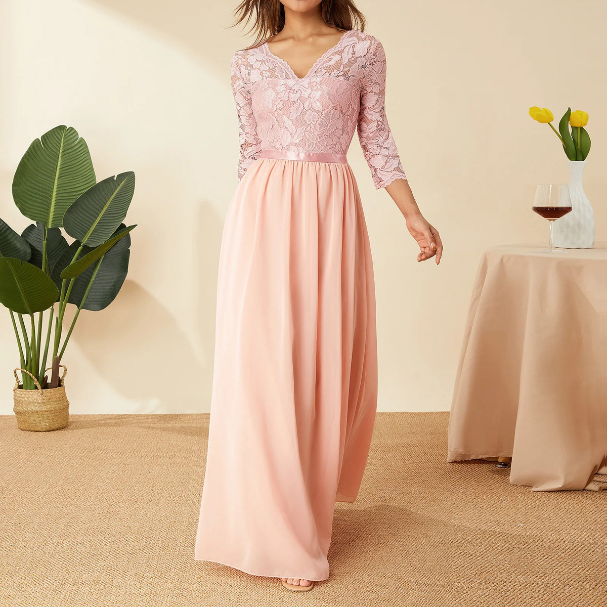 Elegant white lace chiffon long dress by Corporación Turística, featuring flowing fabric and intricate lace details.