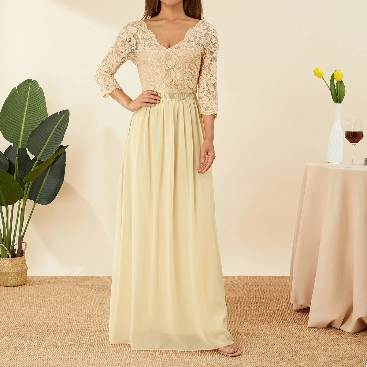 Elegant white long gasa and lace dress by Corporación Turística, featuring flowing fabric and intricate lace details.