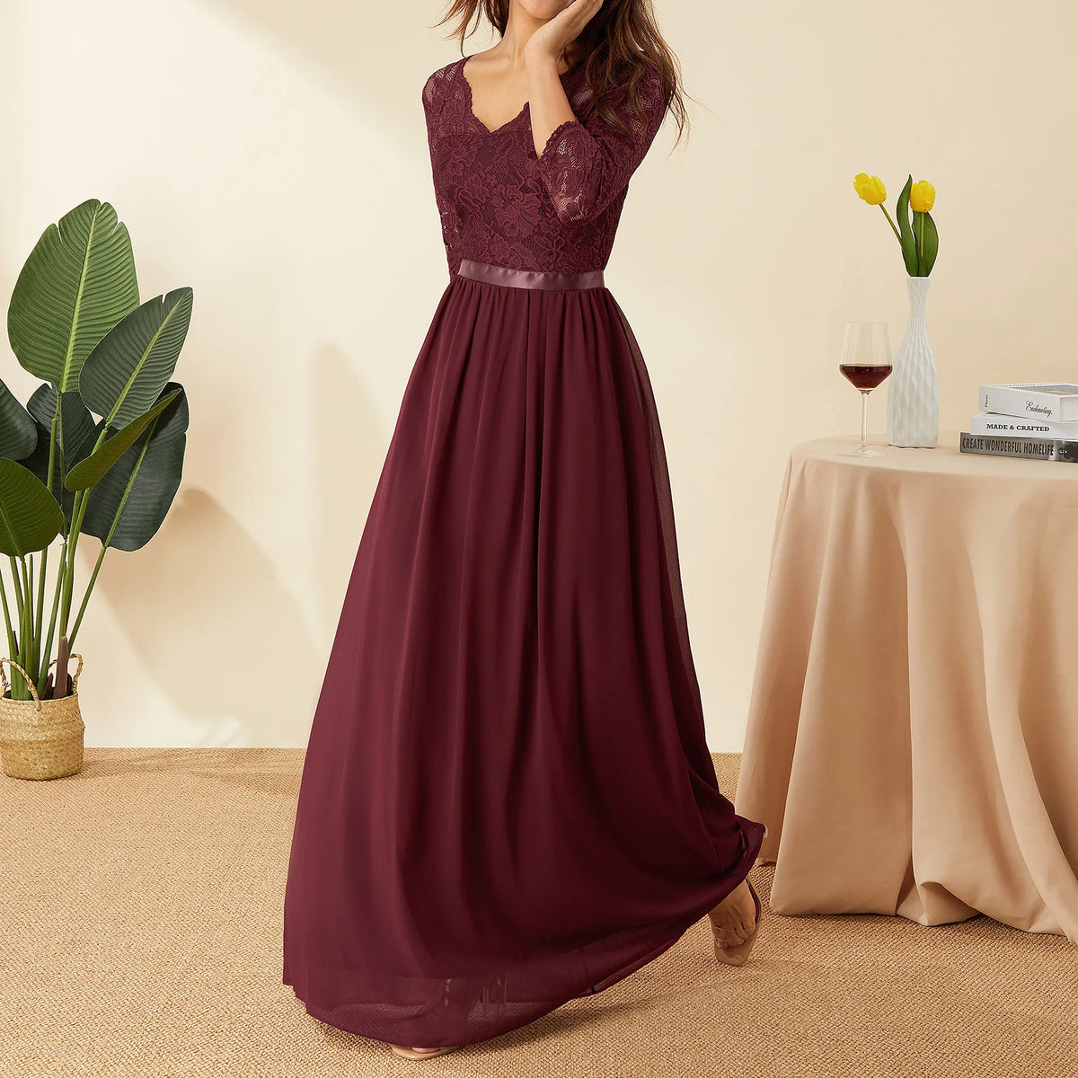 Elegant white long dress with lace and chiffon fabric, featuring a flowing design, perfect for formal occasions.