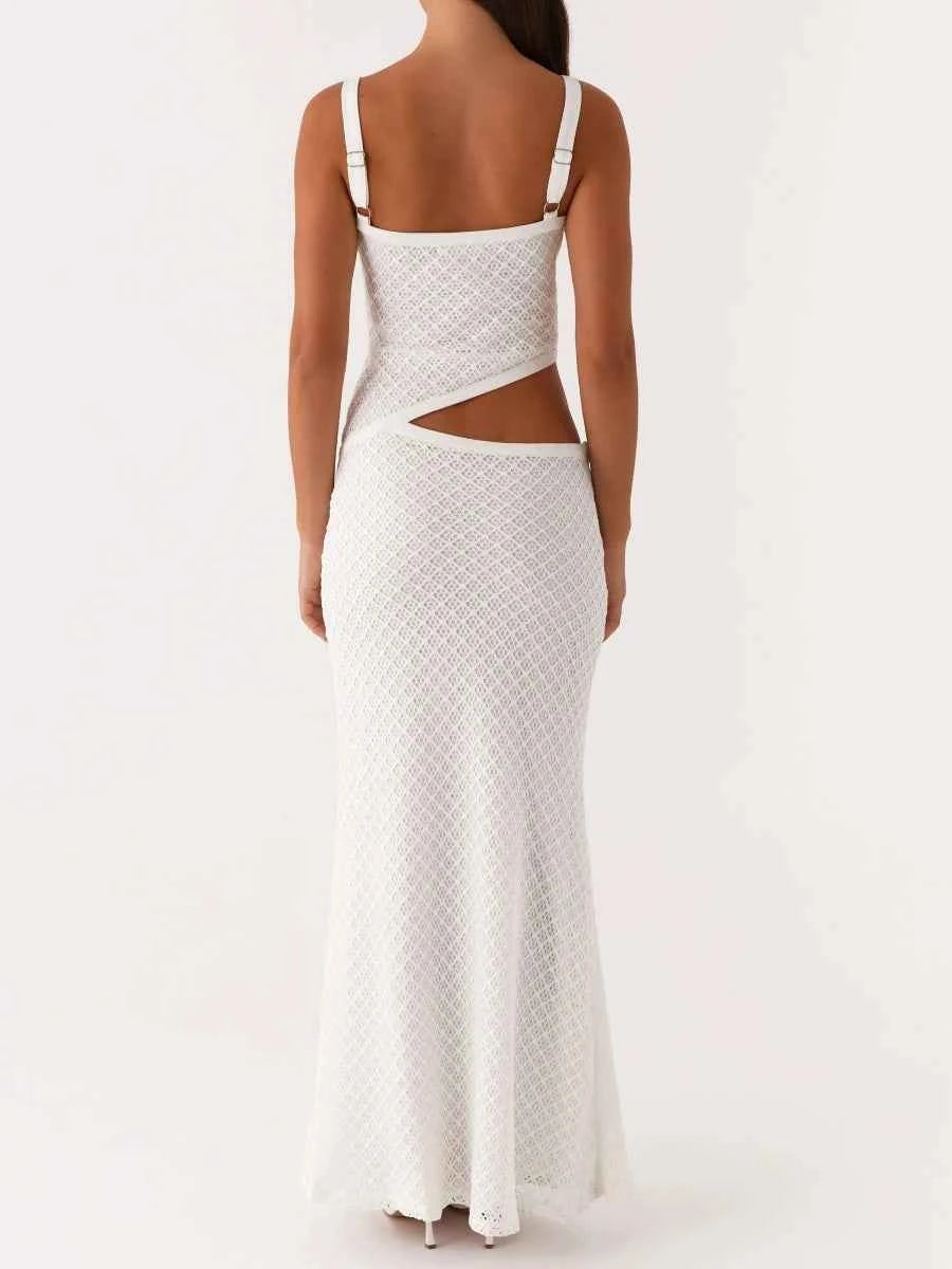 Vestido largo recortado de moda para mujer en color blanco, con diseño elegante y estilo moderno, de la marca Corporación Turística.