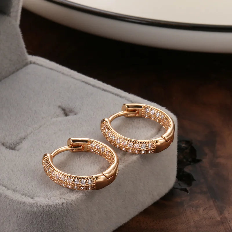 14k gold earrings with diamonds for women, showcasing elegant jewelry design with sparkling diamond accents.