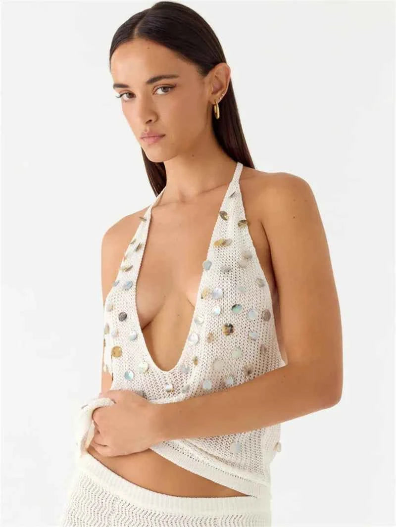 Corporaćón Turística women's white bodycon skirt and top set with sequin details, stylish and fitted for a fashionable look.