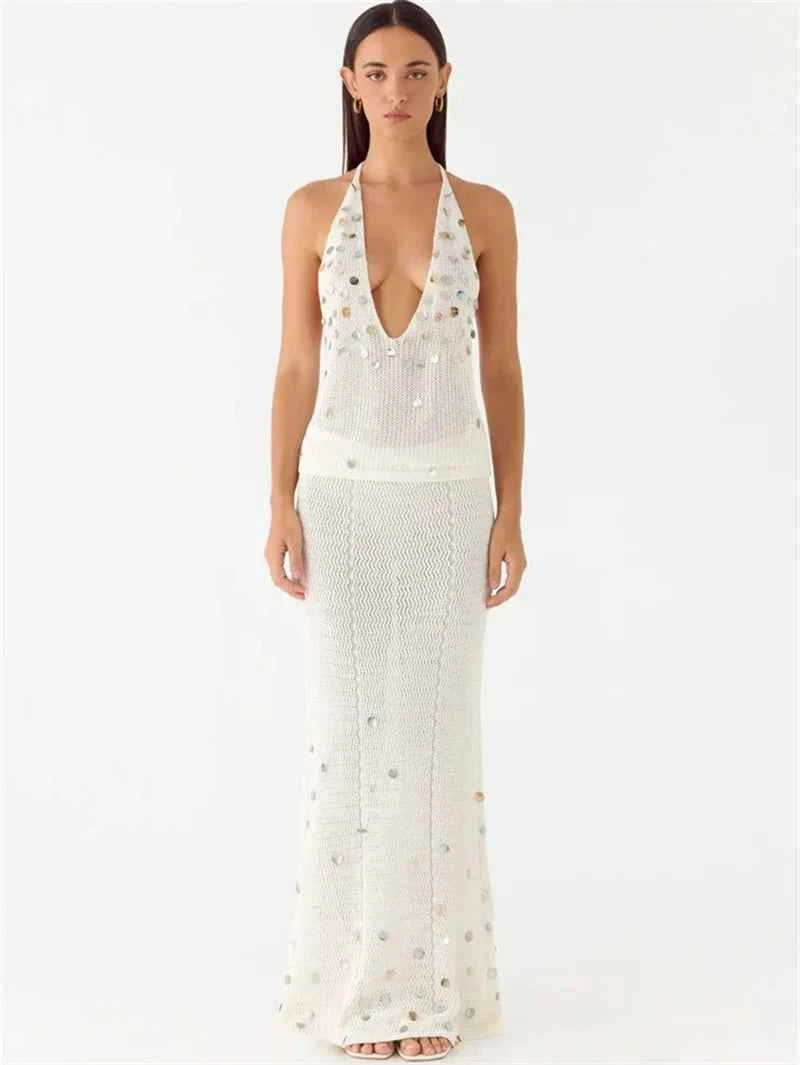 Elegant white bodycon skirt and top set with sequin details for women, stylish ensemble from Corporación Turística.