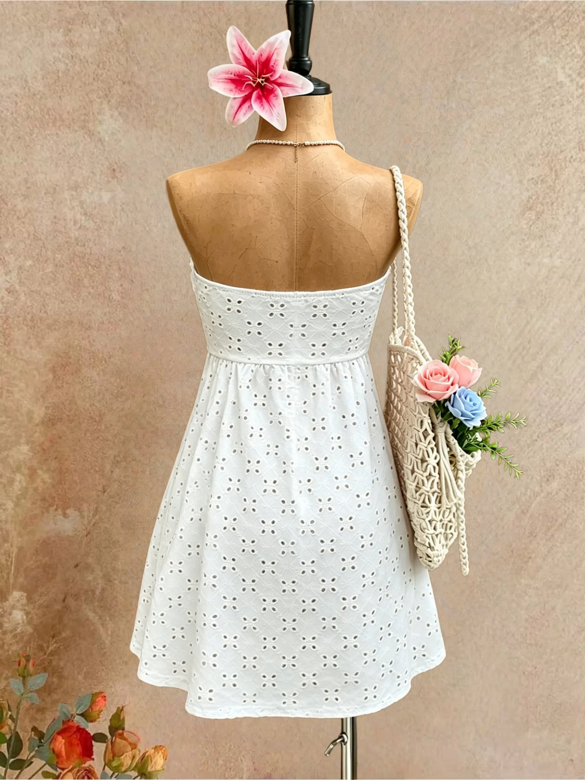 White summer sleeveless short dress for women with ruffle details by Corporación Turística.