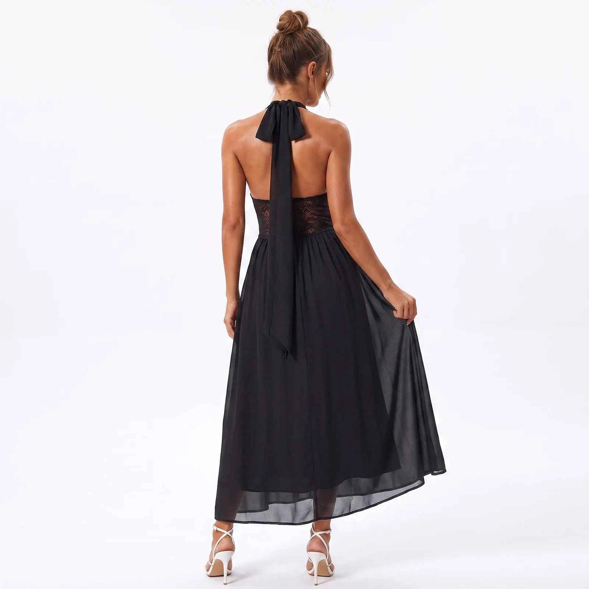 Elegant white long halter dress for women by Corporación Turística, sleeveless and stylish for formal occasions.
