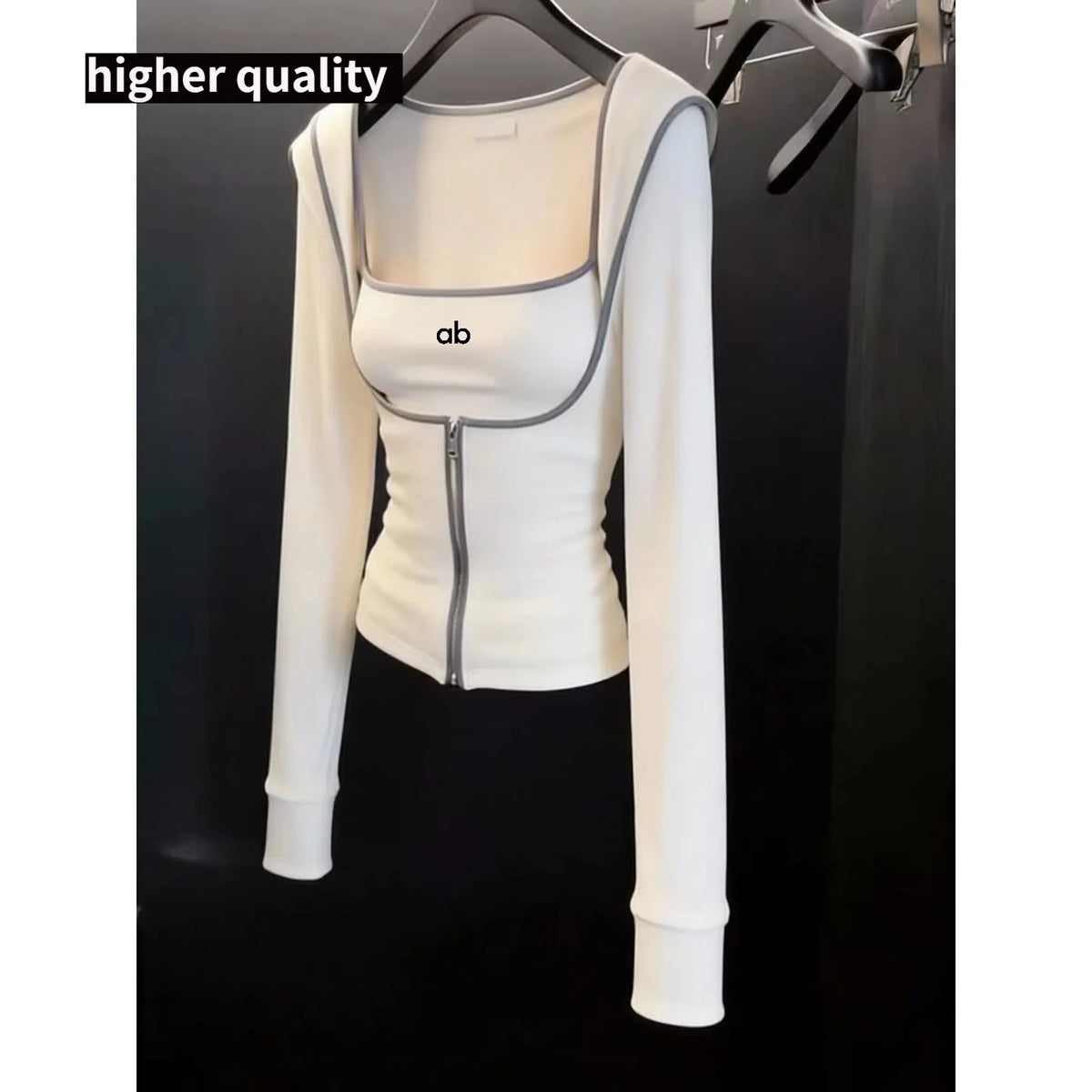 White 2-piece women's yoga set with cardigan from Corporación Turística, featuring a comfortable fit and stylish design.