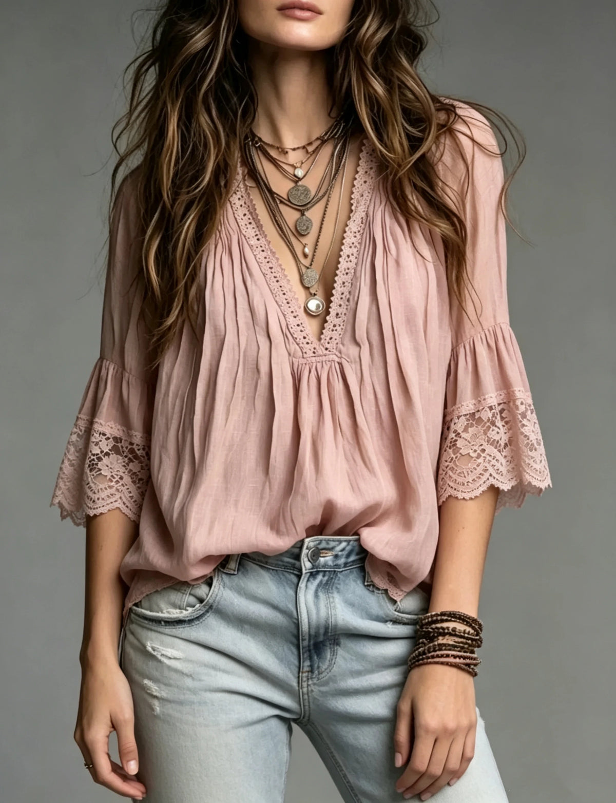 White bohemian V-neck blouse for women with European style, featuring flowy fabric and relaxed fit, by Corporación Turística.