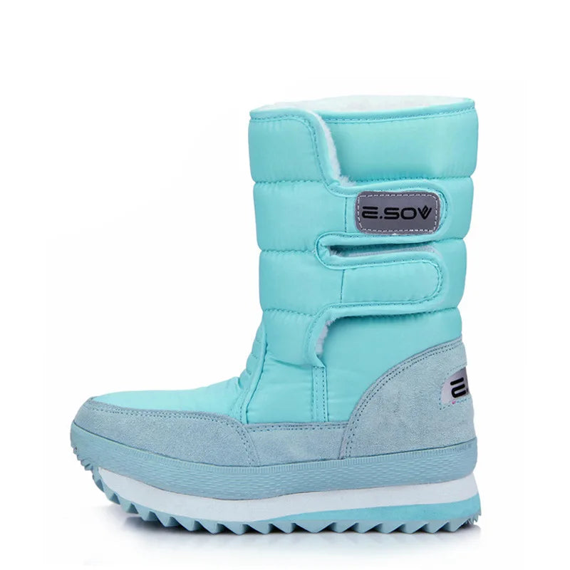 Thick winter snow boots for women by Corporación Turística, blue insulated waterproof footwear for cold weather.