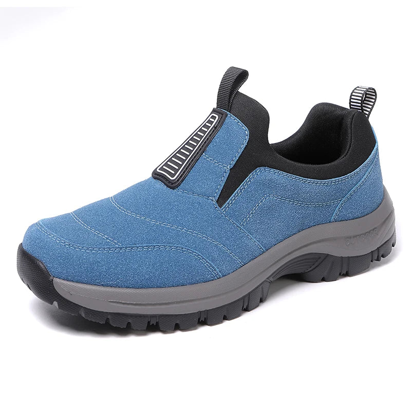 Blue casual men's sports sneakers by Corporación Turística, lightweight athletic shoes with comfortable design.