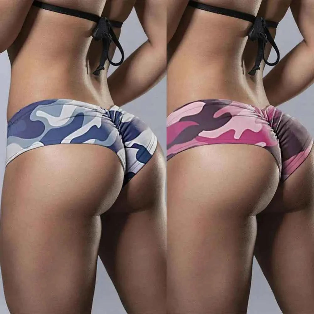 Colorful printed women's shorts by Corporación Turística, casual summer pants with vibrant patterns and comfortable fit.