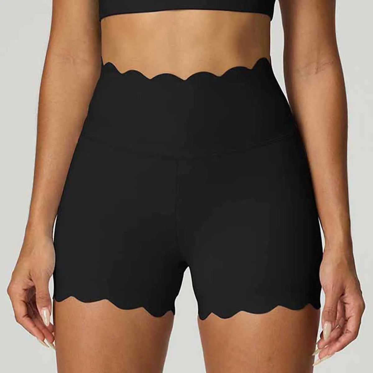 Blue high-waisted women's yoga shorts from Corporación Turística, designed for comfort and abdominal control during exercise.