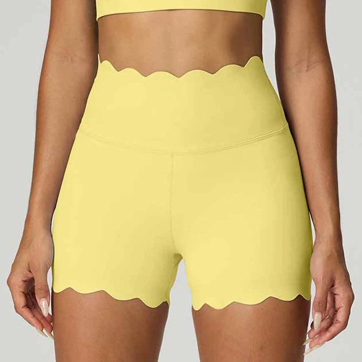 Blue high-waisted yoga shorts for women by Corporación Turística, featuring abdominal control and a comfortable fit.