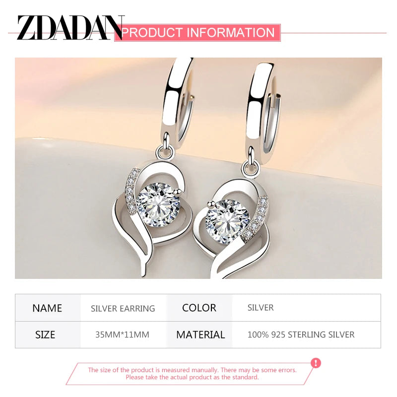 Blue zirconia crystal earrings for women by Corporación Turística, featuring sparkling round-cut stones and elegant design.