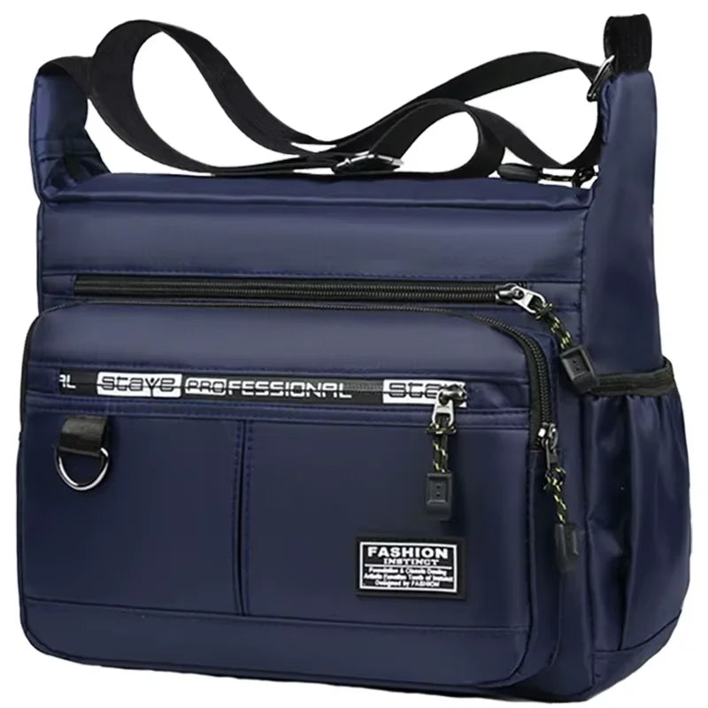 Black nylon men's crossbody bag with multiple layers, ideal for business travel, from Corporación Turística.