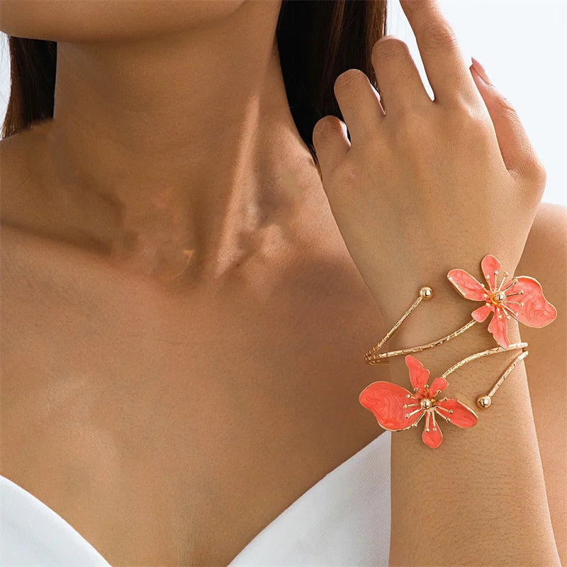 Bohemian floral enamel bracelet for women featuring colorful flower designs, crafted by Corporación Turística.