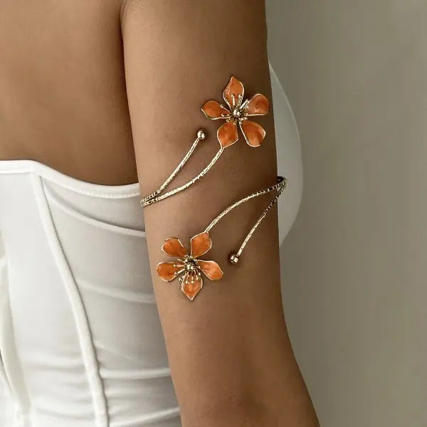 Open multicolored floral bracelet by Corporación Turística featuring hollow flower designs on a vibrant band.