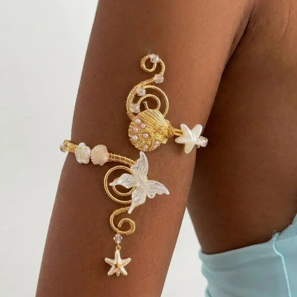 Open multicolored floral bracelet by Corporación Turística featuring hollow flower designs and vibrant colors.