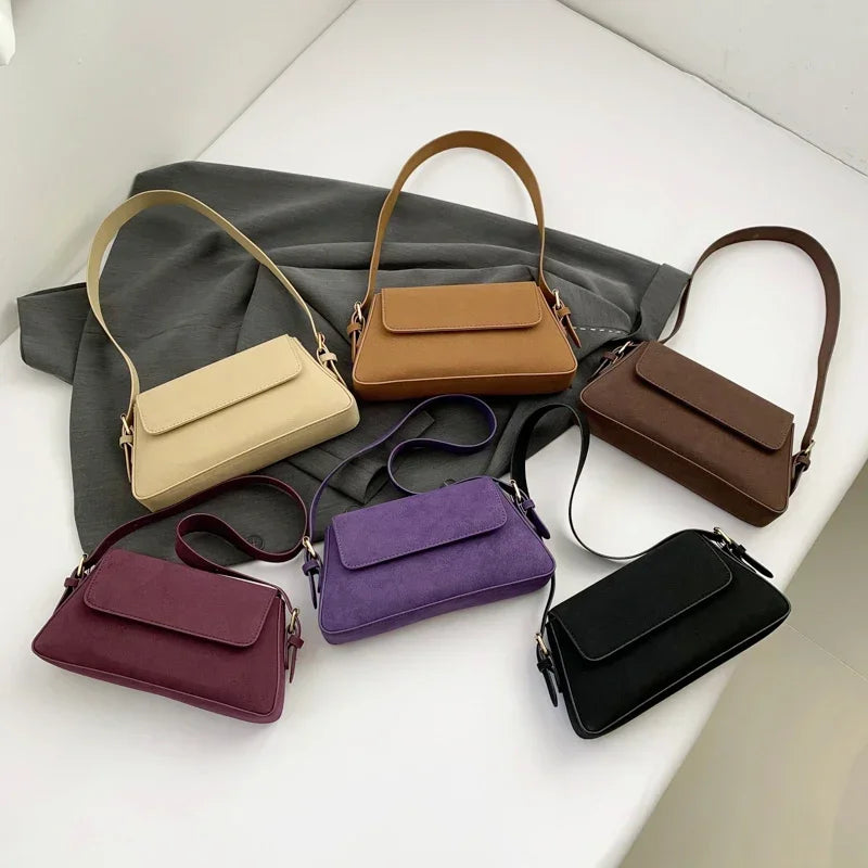 Luxury purple single-shoulder handbag for women by Corporación Turística, featuring a sleek design and 30cm size.