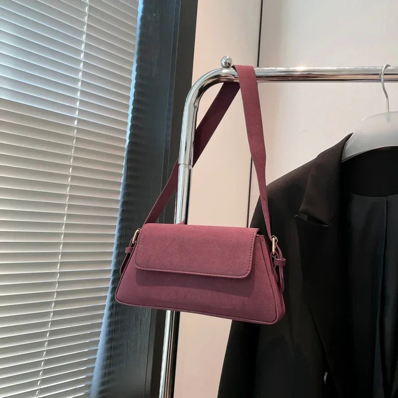 Luxury purple single-shoulder handbag for women by Corporación Turística, featuring a stylish design and 30cm size.