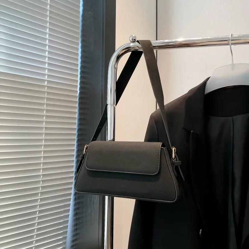 Luxury purple single-shoulder women's handbag by Corporación Turística, made of high-quality material, 30cm size, stylish design.