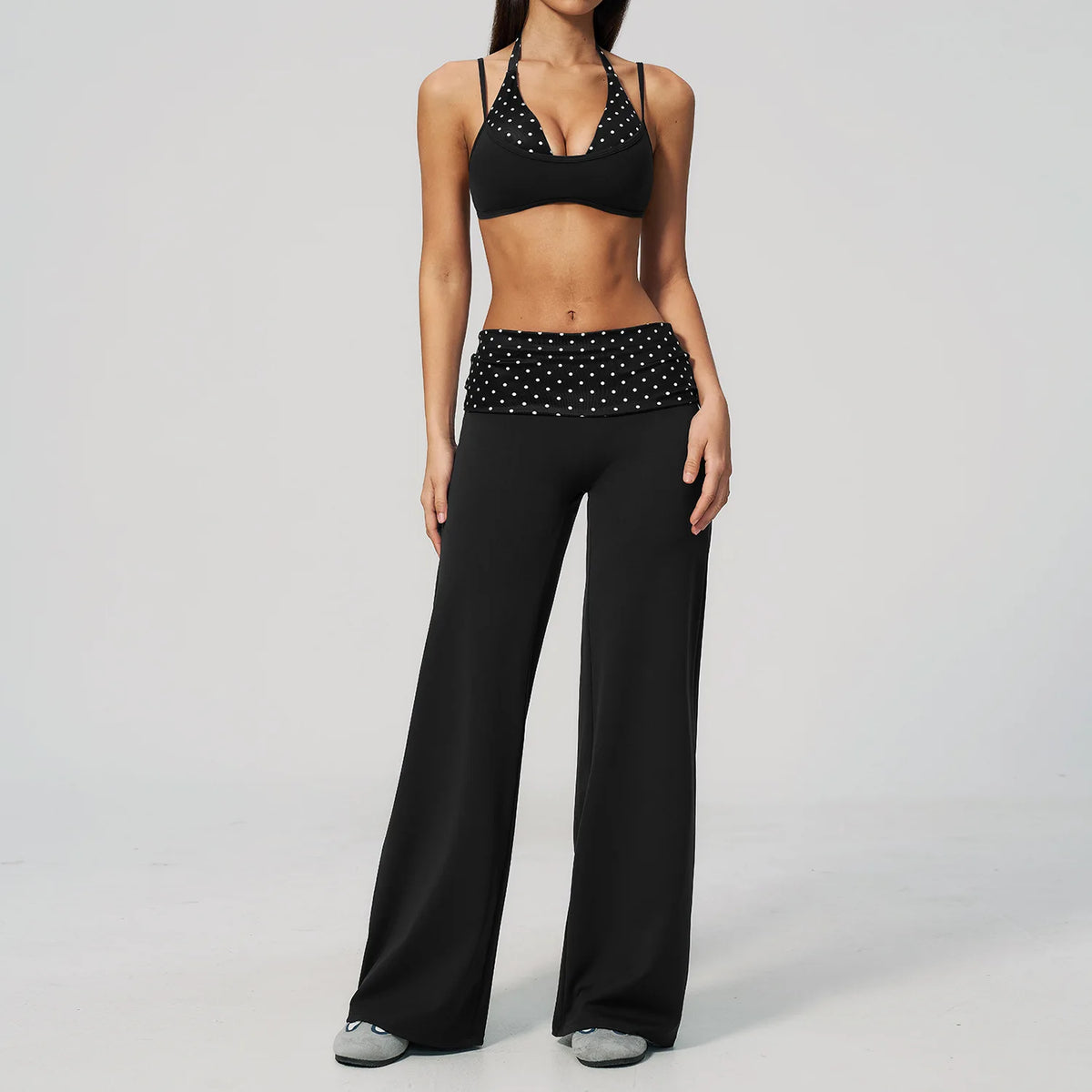 Brown dotted 2-piece yoga set for women by Corporación Turística, includes a sports top and matching leggings.