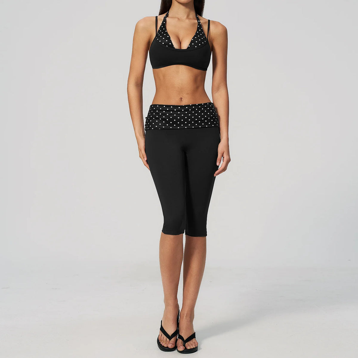Brown dotted 2-piece yoga set by Corporación Turística, includes a sports top and leggings for women, designed for active wear.