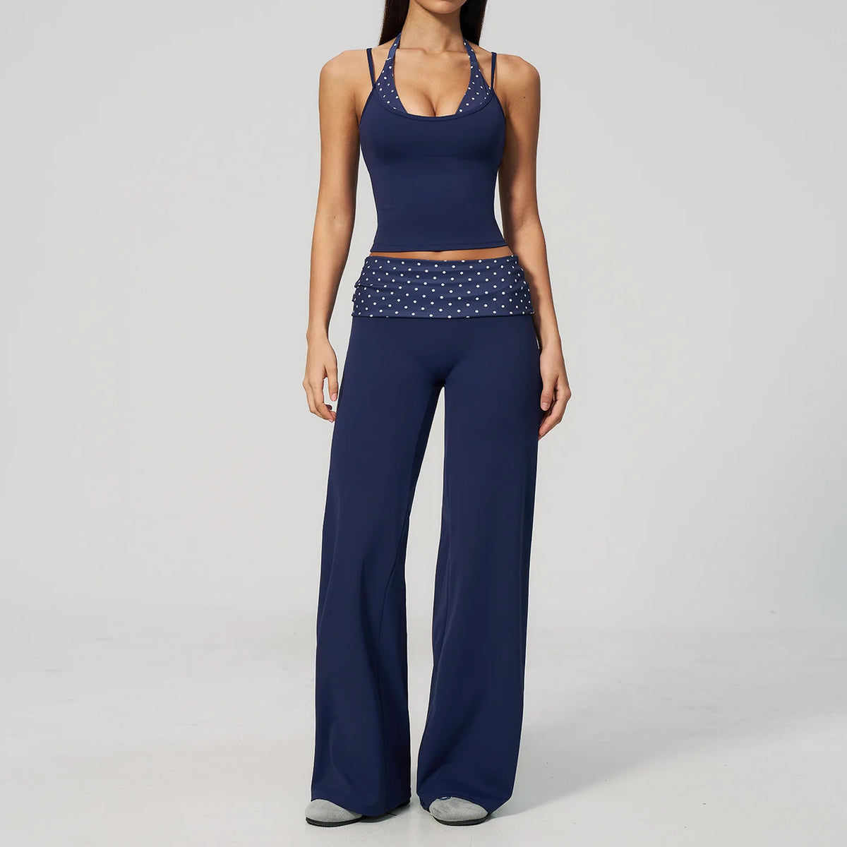 Brown dotted 2-piece yoga set for women by Corporación Turística, includes a sports bra and leggings, perfect for active wear.