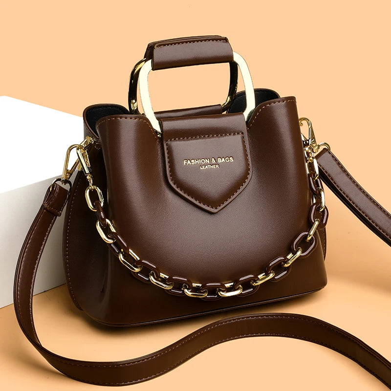 High-quality brown women's shoulder bag made of PU leather from Corporación Turística, featuring a stylish and functional design.