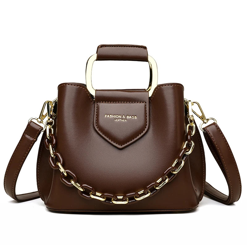 High-quality brown PU shoulder bag for women, stylish and spacious, by Corporación Turística.