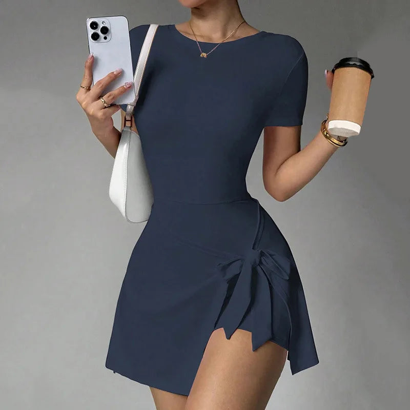 Brown women's tennis dress with a two-piece design and open back, perfect for active wear and sports.