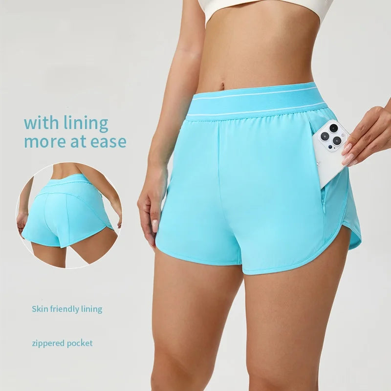 Brown quick-drying yoga shorts by Corporación Turística, designed for comfortable vacation wear and outdoor activities.