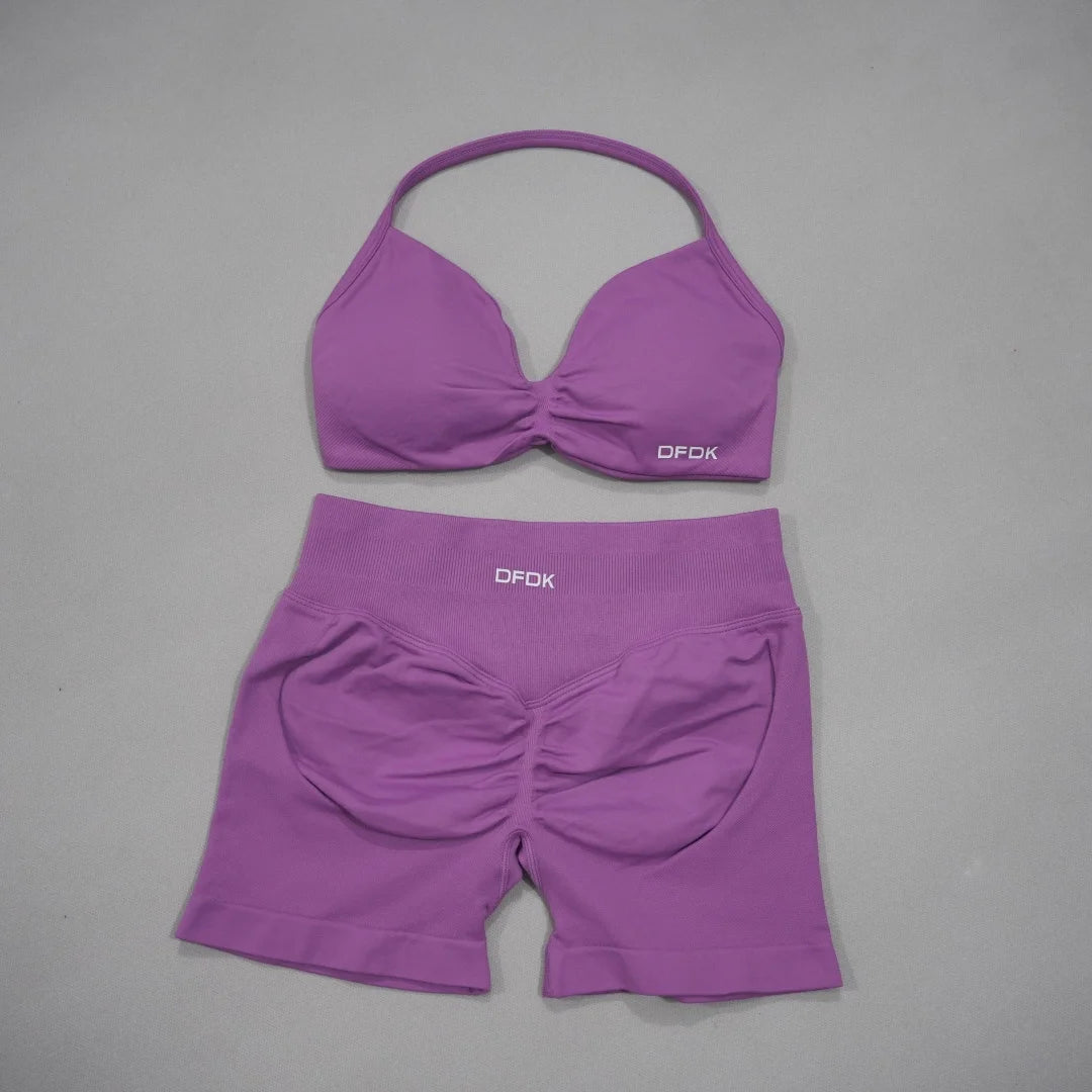 Brown women's 2-piece sports set with DFDK sports bra and shorts, comfortable athletic wear from Corporación Turística.