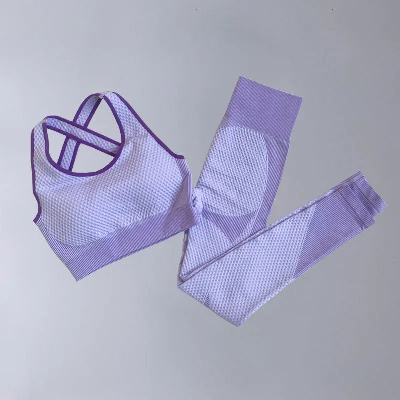Lavender women's athletic yoga set by Corporación Turística, two-piece sports outfit with top and leggings for active wear.
