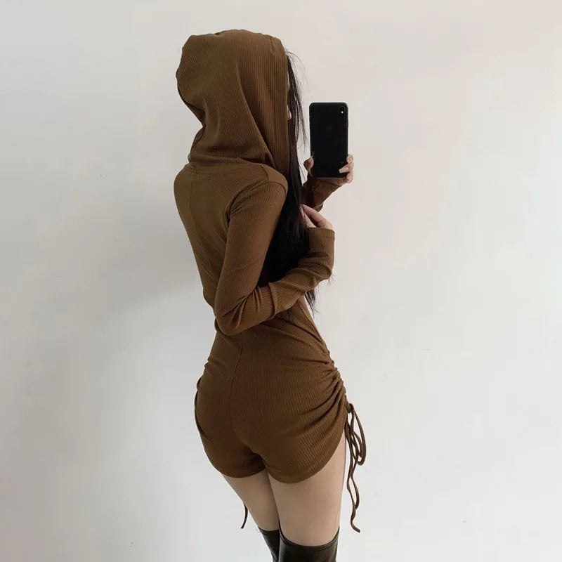 Black Wasteland-style hooded romper for women, casual jumpsuit with a relaxed fit, made by Corporación Turística.