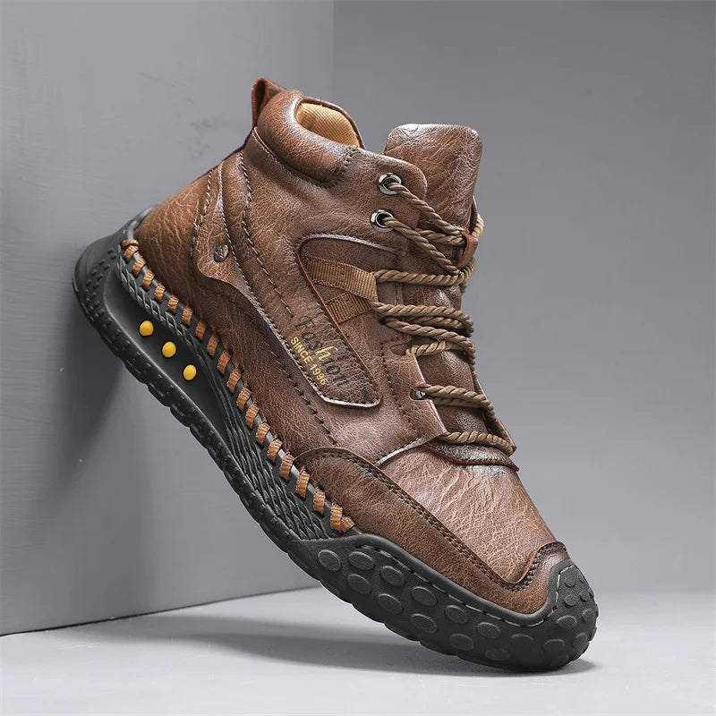 Man's handcrafted camel-colored casual fashion boots by Corporación Turística, made with sewn details and comfortable design.