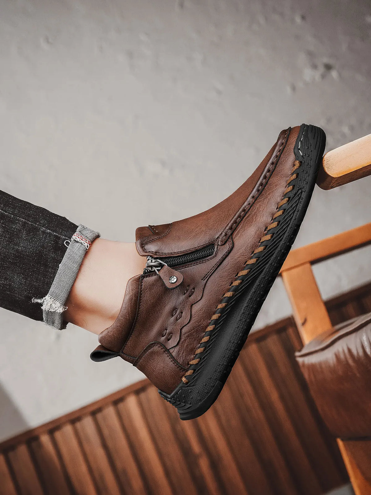 Pair of men's fashion tall boots by Corporación Turística in camel color, stylish and modern footwear for men.