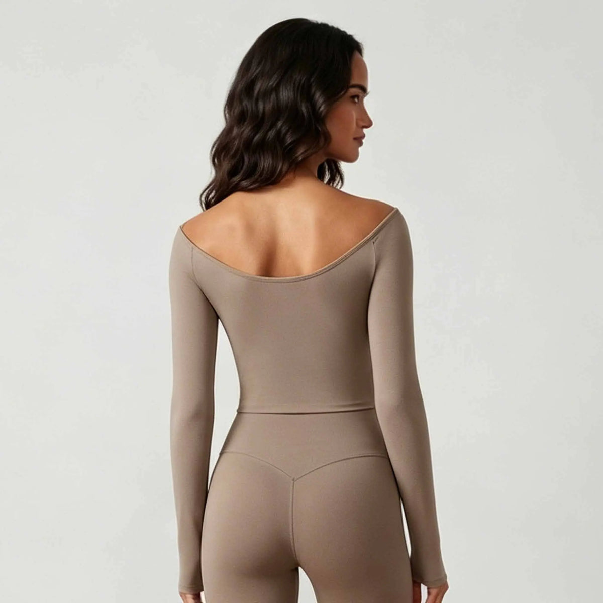 Gray women's sporty tank top with off-shoulder design and short sleeves by Corporación Turística, ideal for active wear.