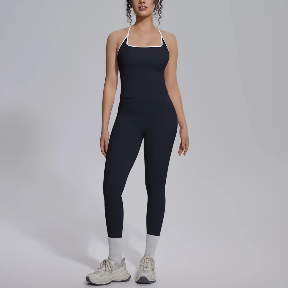 Green women's 2-piece yoga set by Corporación Turística, includes a fitted top and matching leggings for gym and yoga workouts.