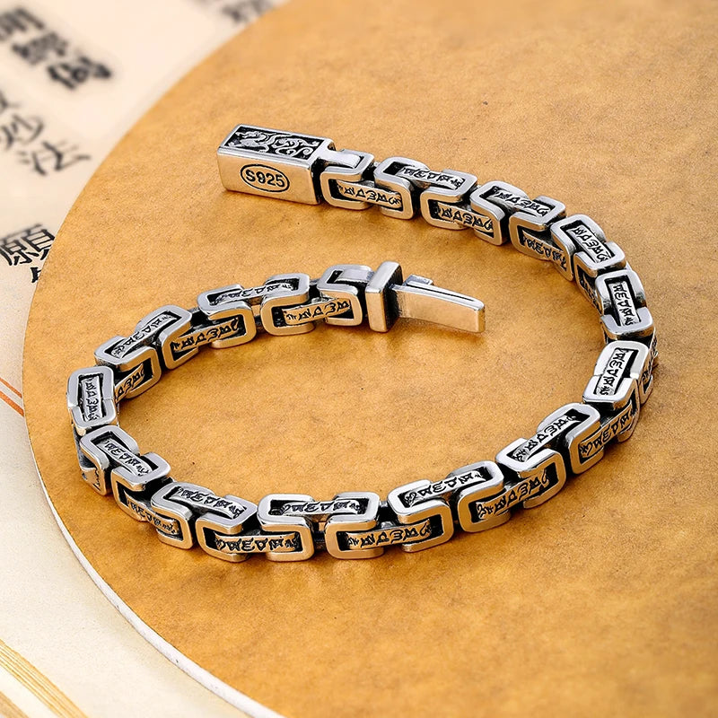 Silver plated HX Hanfeng dragon pattern Mantra of six characters bracelet by Corporación Turística, featuring intricate dragon and mantra design.