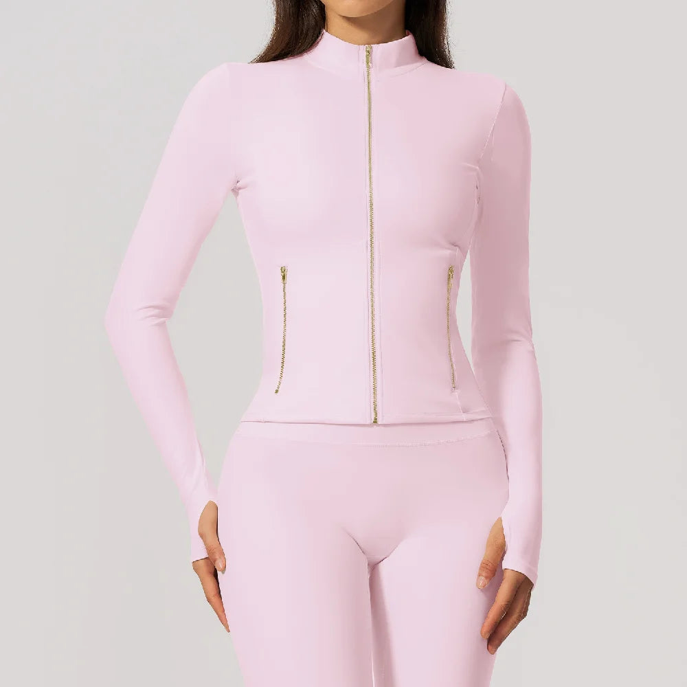 Pink slim-fit sports long-sleeve t-shirt with front zipper from Corporación Turística, featuring a cherry blossom design.