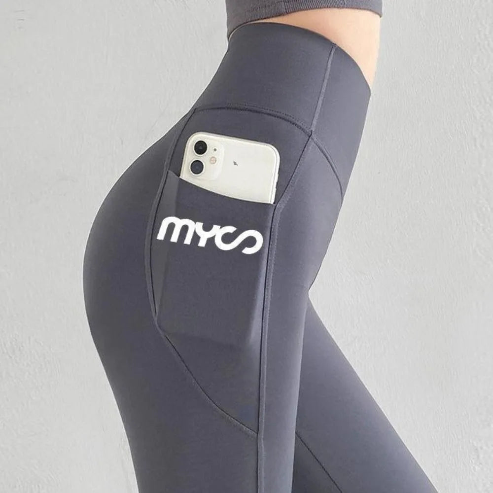 Seamless black women's leggings with pocket from Corporación Turística, featuring a smooth, fitted design and comfortable stretch fabric.
