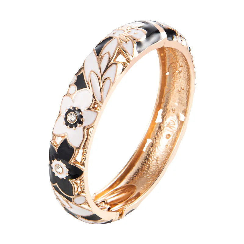 Double-esma bracelet set for women, featuring stylish matching bangles with intricate designs, crafted by Corporación Turística.