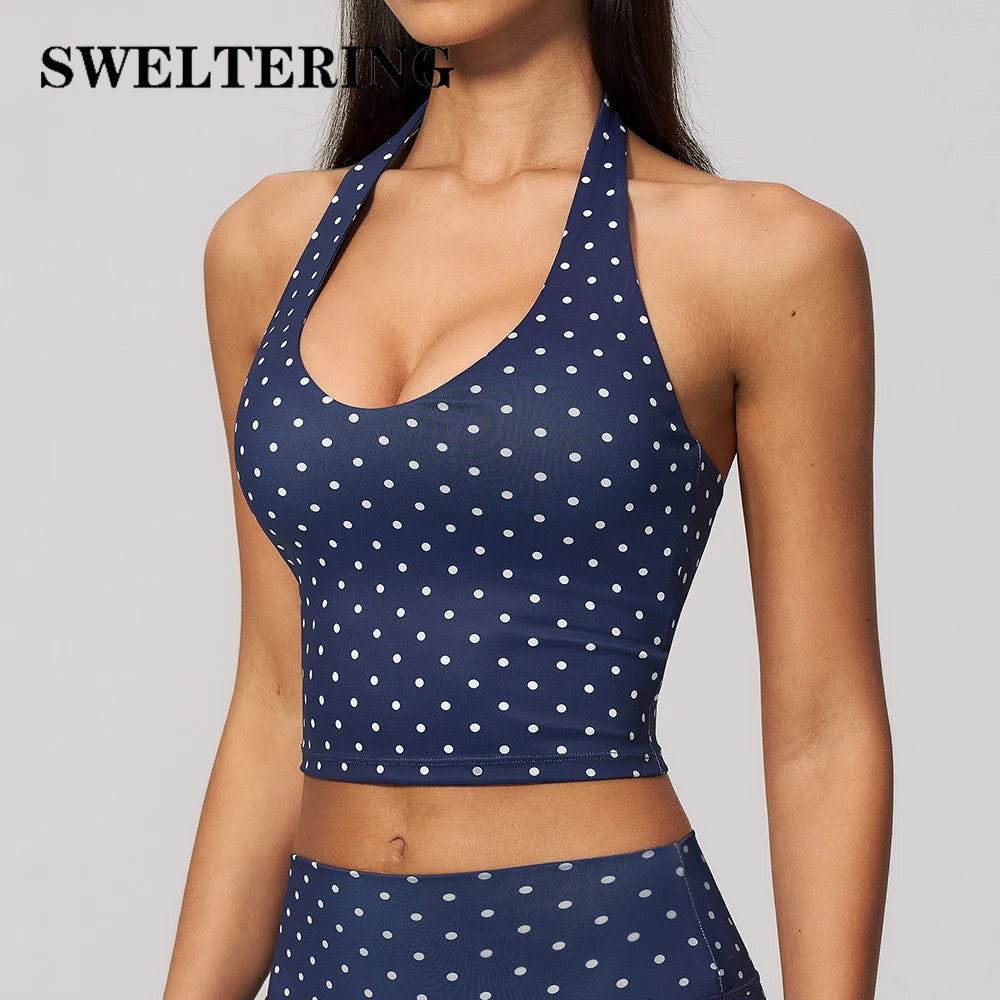 Dark blue yoga halter top with wave design from Corporación Turística, featuring a sporty, supportive fit for active wear.