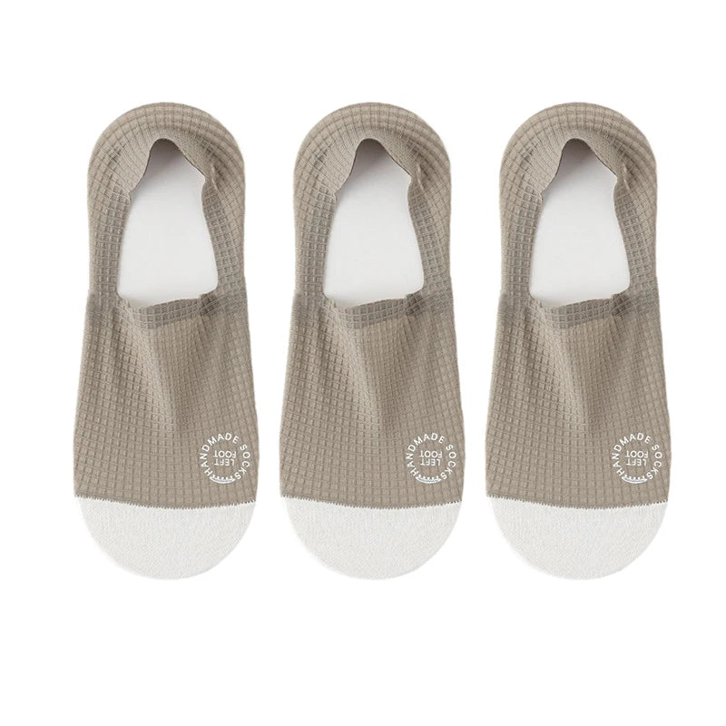Three pairs of dark grey men's invisible socks from Corporación Turística, size EU 37-44, shown flat on a white background.
