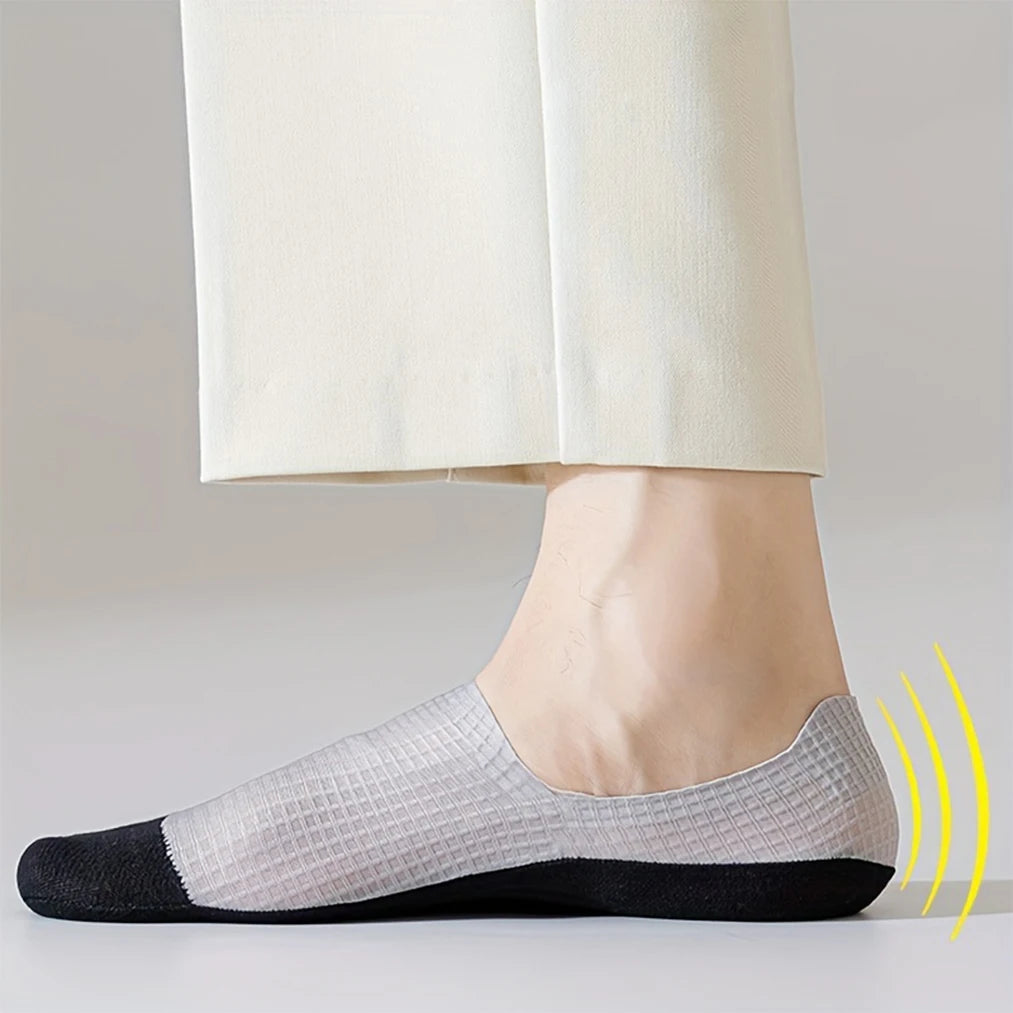 Three pairs of dark grey men's invisible socks from Corporación Turística, suitable for European shoe sizes 37-44.