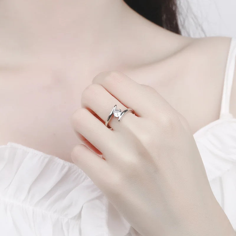 Sterling silver 925 ring with a simple sparkling cubic zirconia stone, elegant jewelry piece from Corporación Turística.