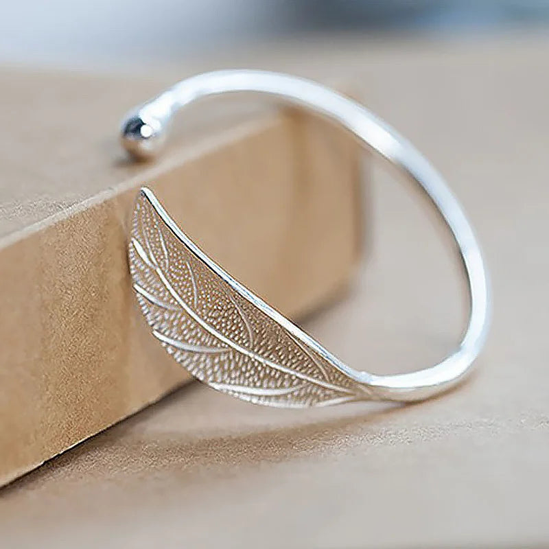 Sterling silver 925 fashionable bracelet for women with intricate design, stylish jewelry accessory.